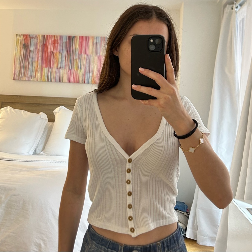 White button down v neck short sleeve top. New with tags